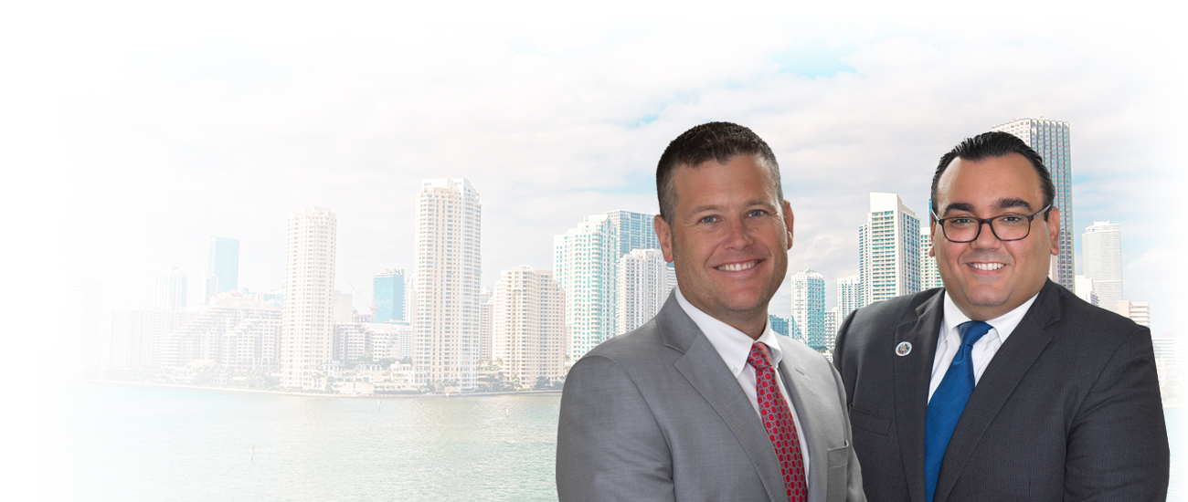 Attorney's Photo in front of Miami buildings